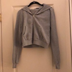 Cropped zip up sweatshirt.